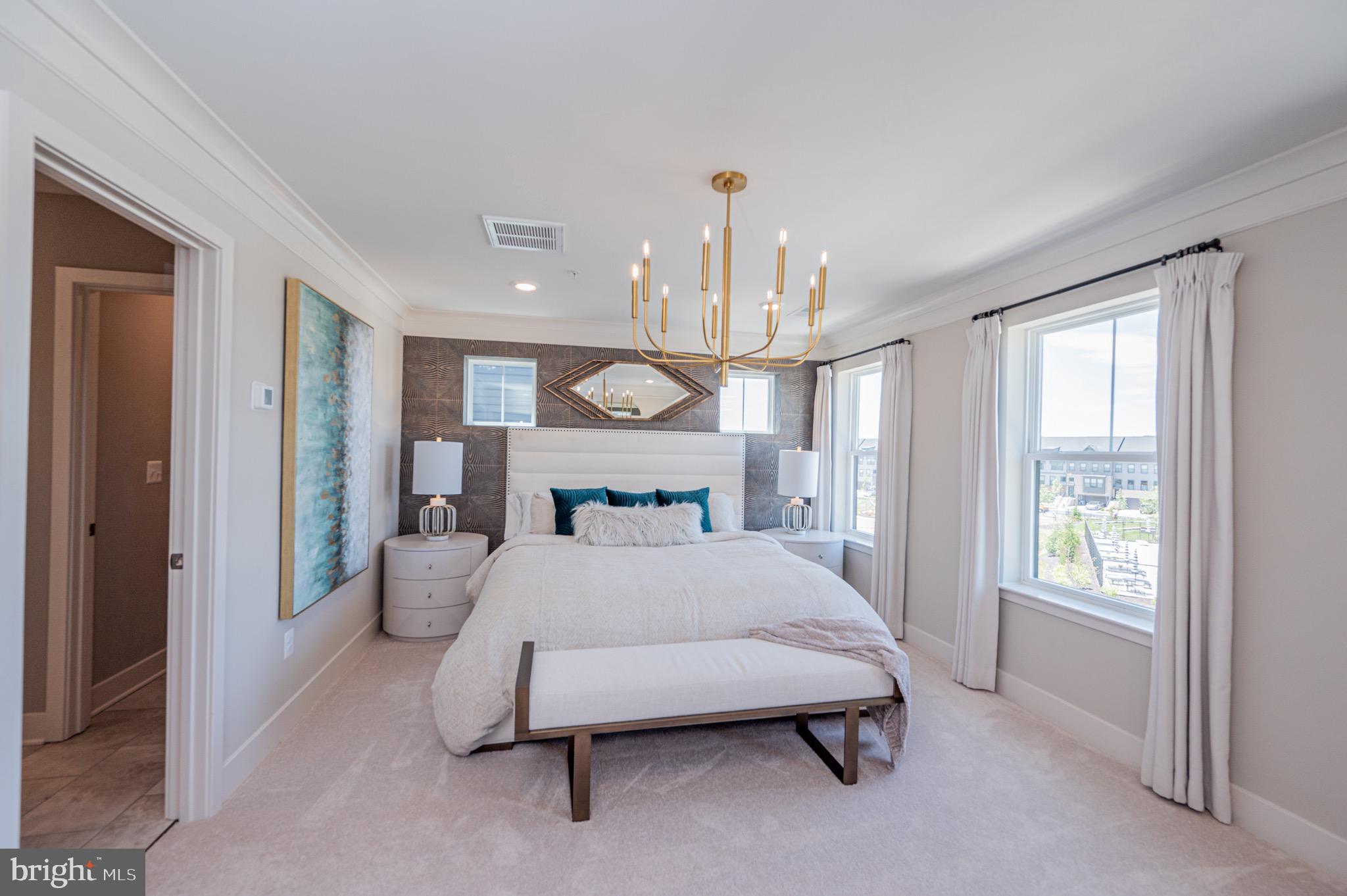 7209 Paper Way Glen Burnie, MD 21060 - Photo 30 of 40 a bed room with a bed window and a mirror