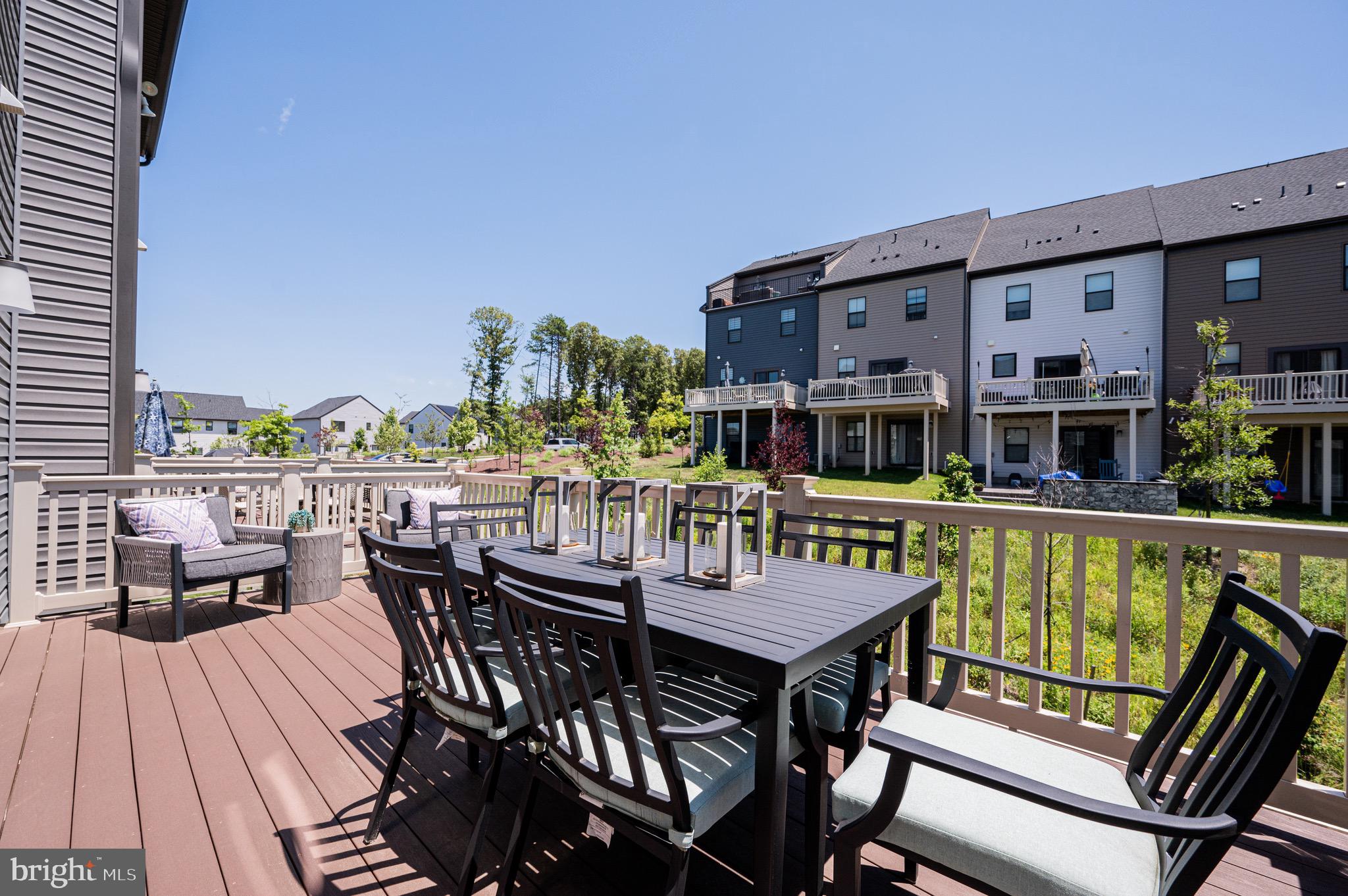 7209 Paper Way Glen Burnie, MD 21060 - Photo 33 of 40 a view of a roof deck with furniture