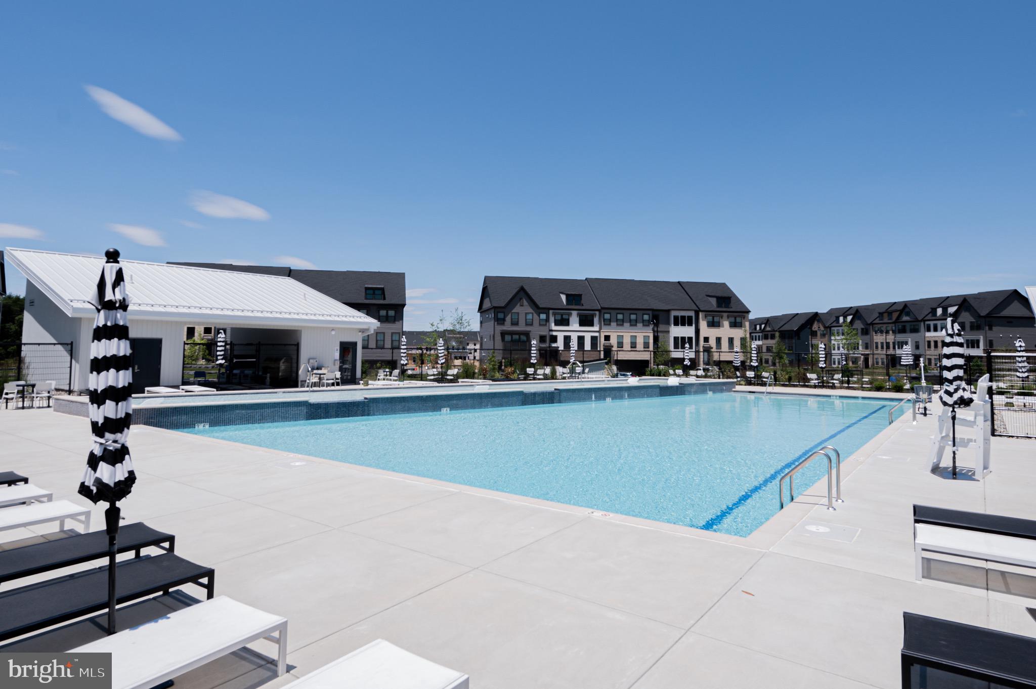 7209 Paper Way Glen Burnie, MD 21060 - Photo 38 of 40 a view of a kitchen with kitchen island and a workspace