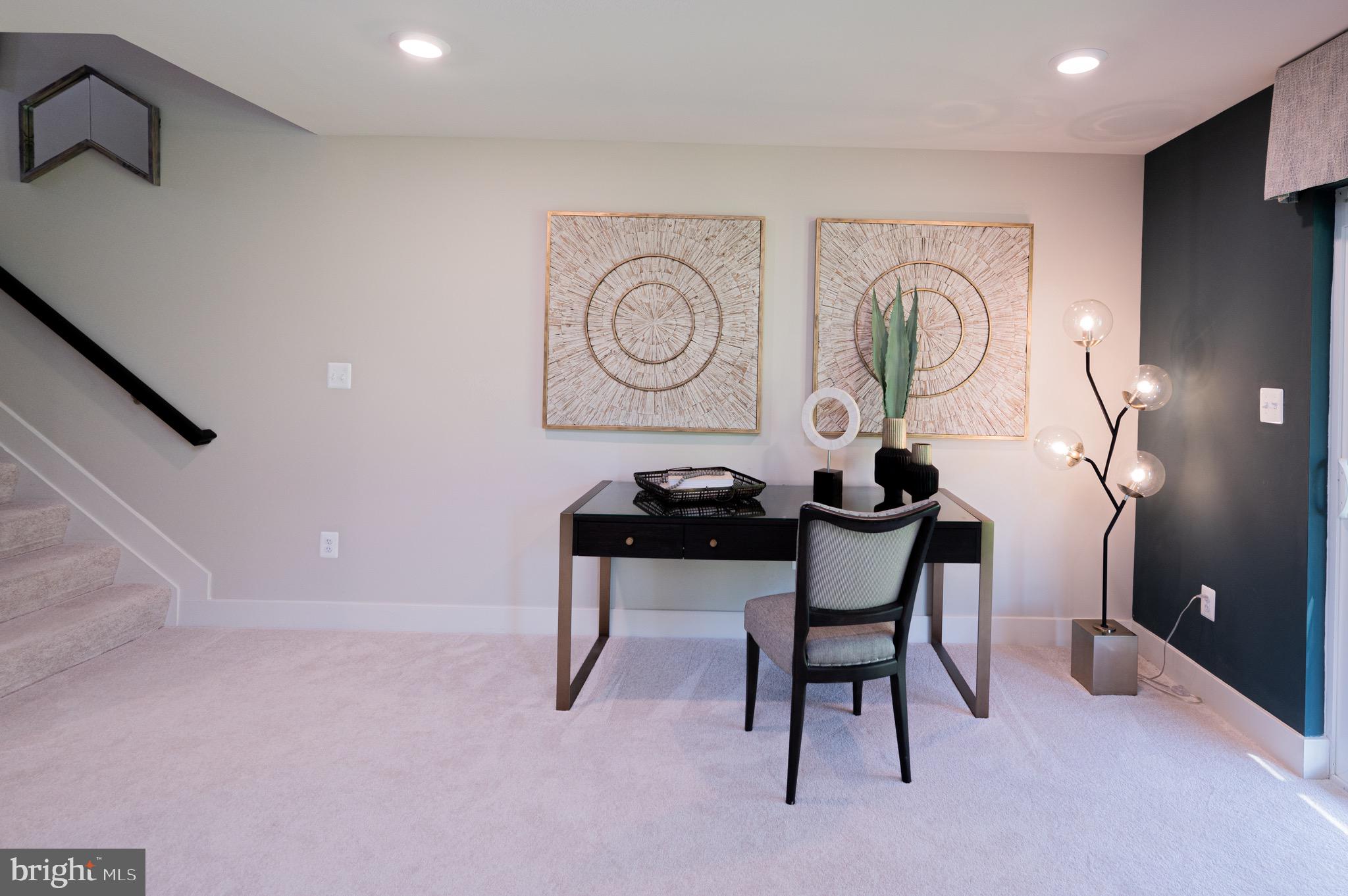 7209 Paper Way Glen Burnie, MD 21060 - Photo 6 of 40 a view of a table and chairs in a room