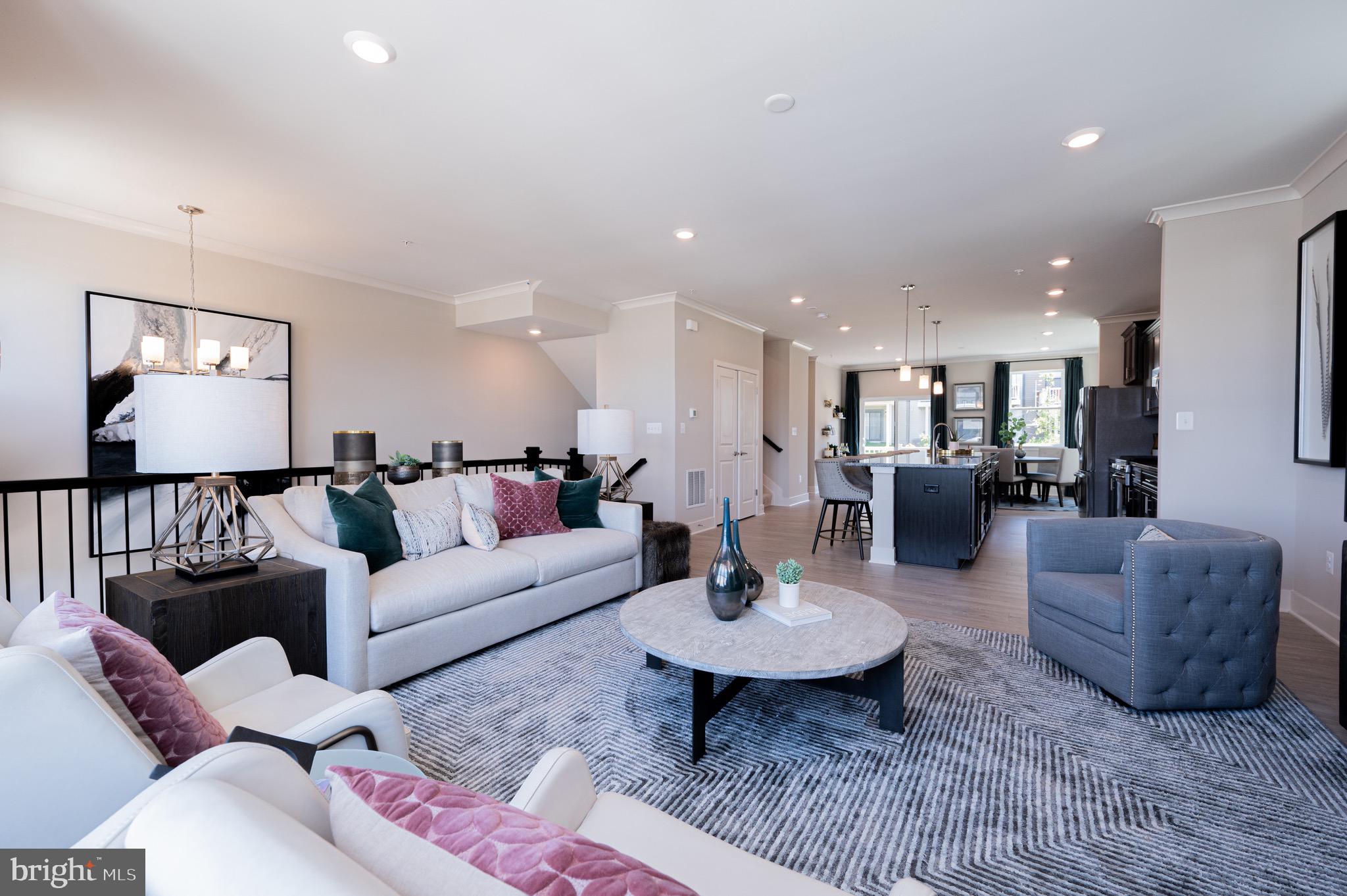 7209 Paper Way Glen Burnie, MD 21060 - Photo 10 of 40 a living room with furniture and wooden floor
