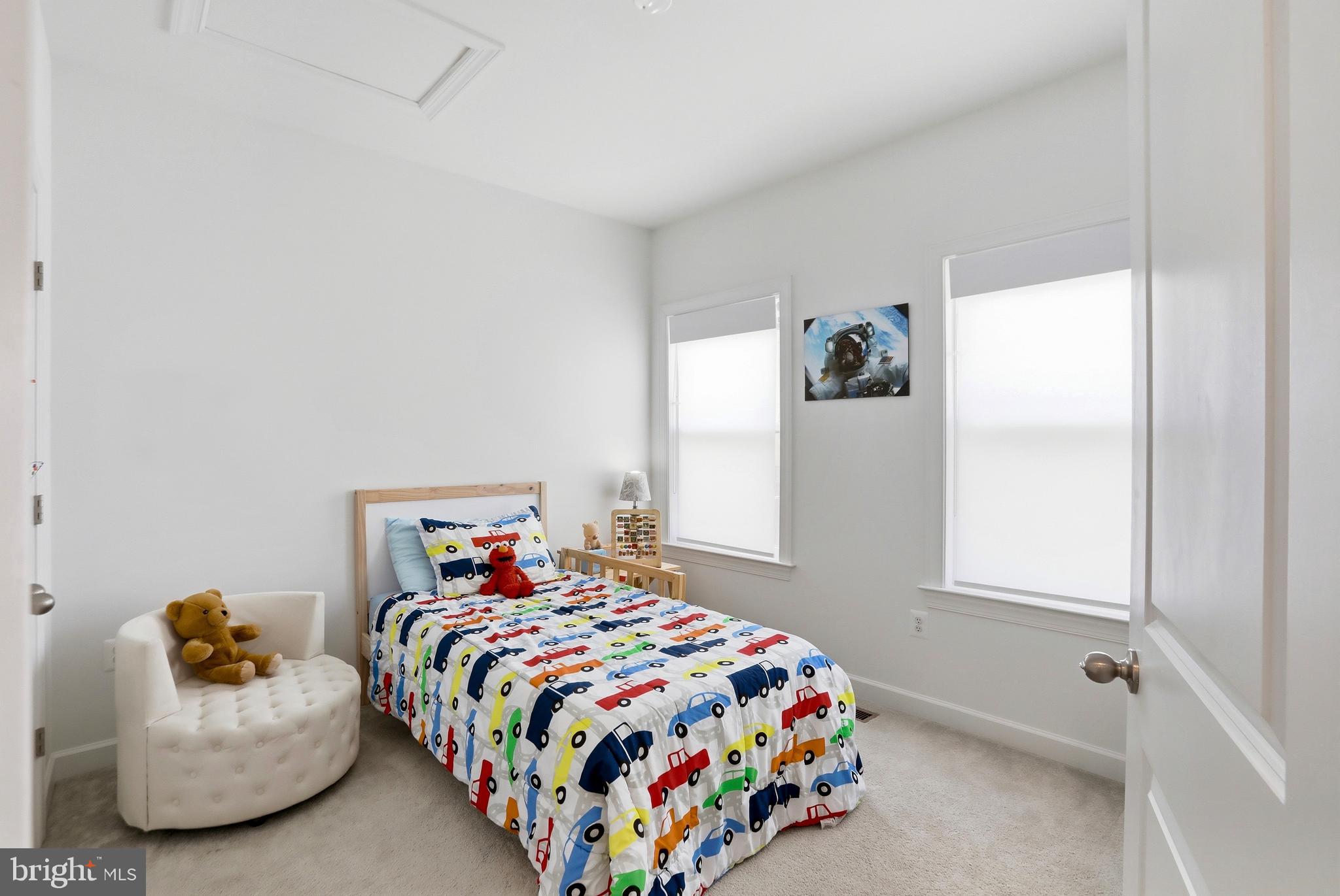 4965 Longmire Way Chantilly, VA 20151 - Photo 18 of 41 a bedroom with a bed and a window
