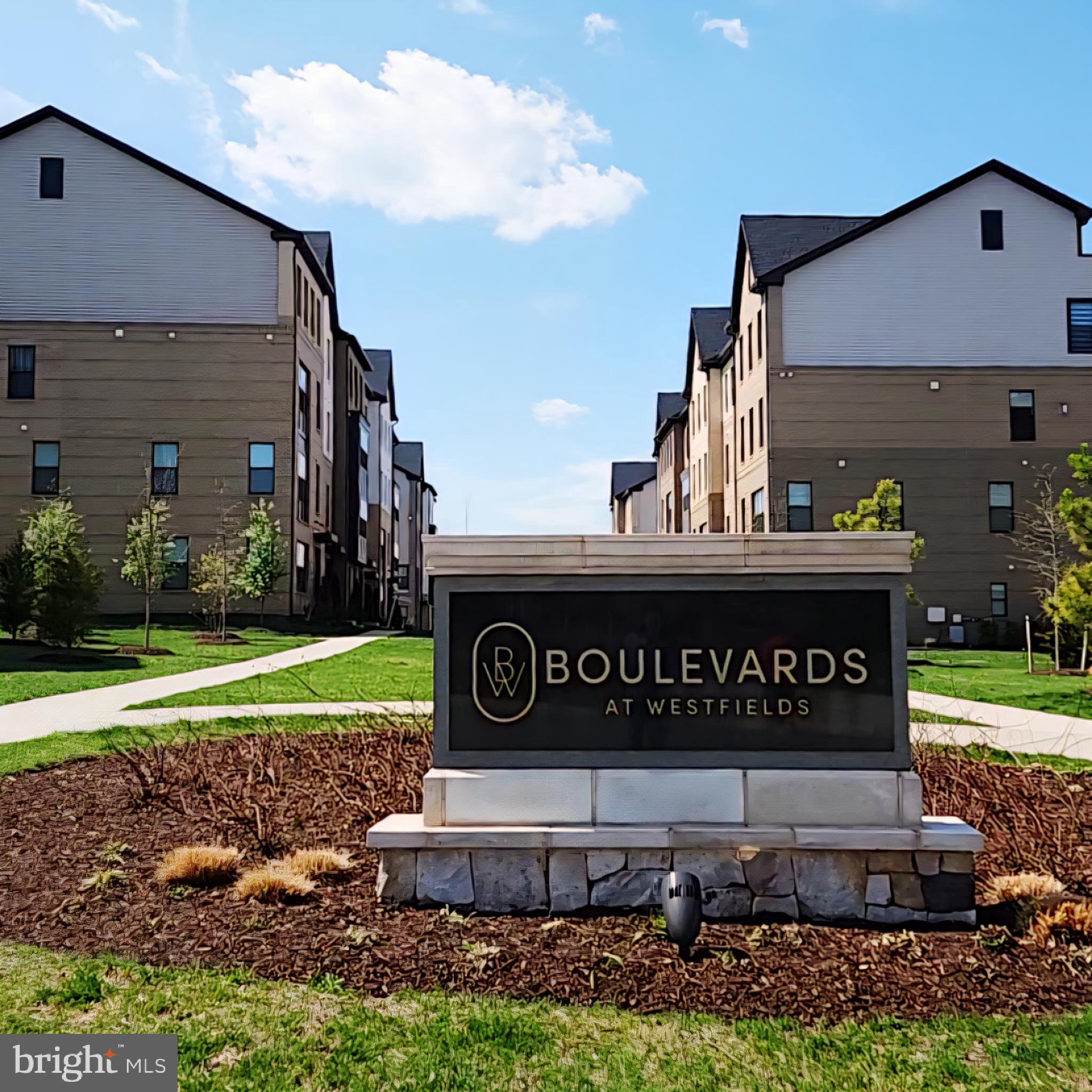 4965 Longmire Way Chantilly, VA 20151 - Photo 32 of 41 a view of a street sign of a house
