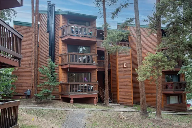 a red brick building with glass windows