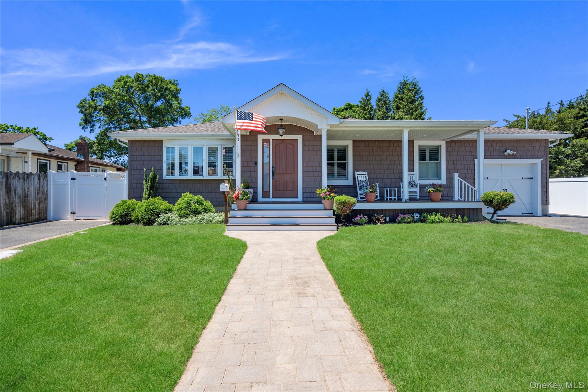 190 Sexton Road West Babylon, NY 11704 - Photo 1 of 28 a front view of a house with a yard and potted plants