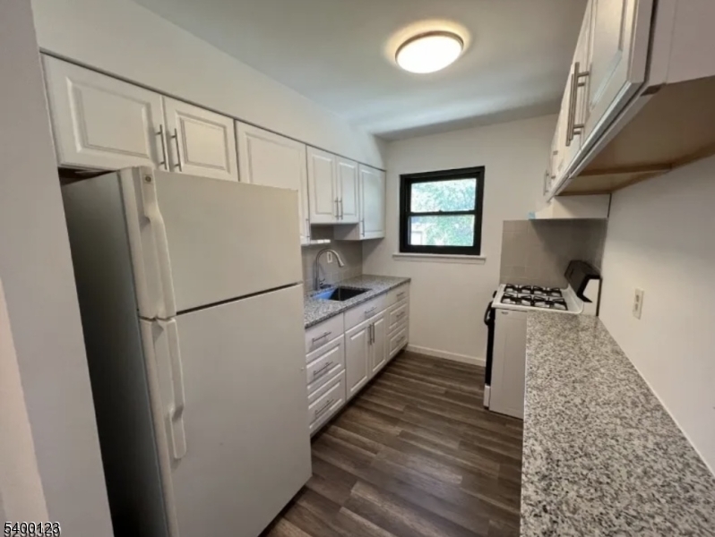 401 Highway 22 Plainfield, NJ 07060 - Photo 1 of 9 a kitchen with a refrigerator and a sink
