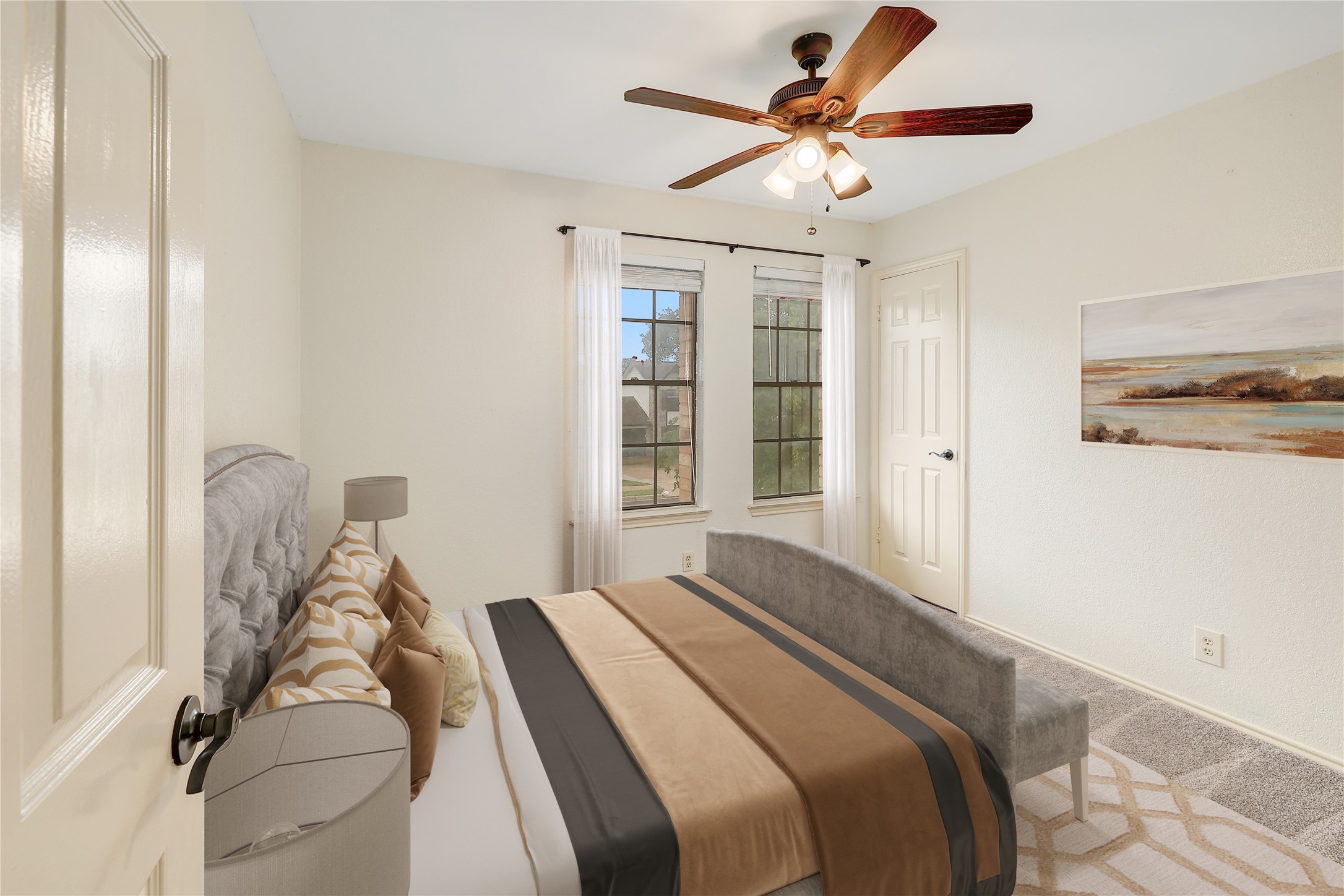 409 Cedar Mound Pass Cedar Park, TX 78613 - Photo 12 of 18 a bedroom with a large bed and a chandelier