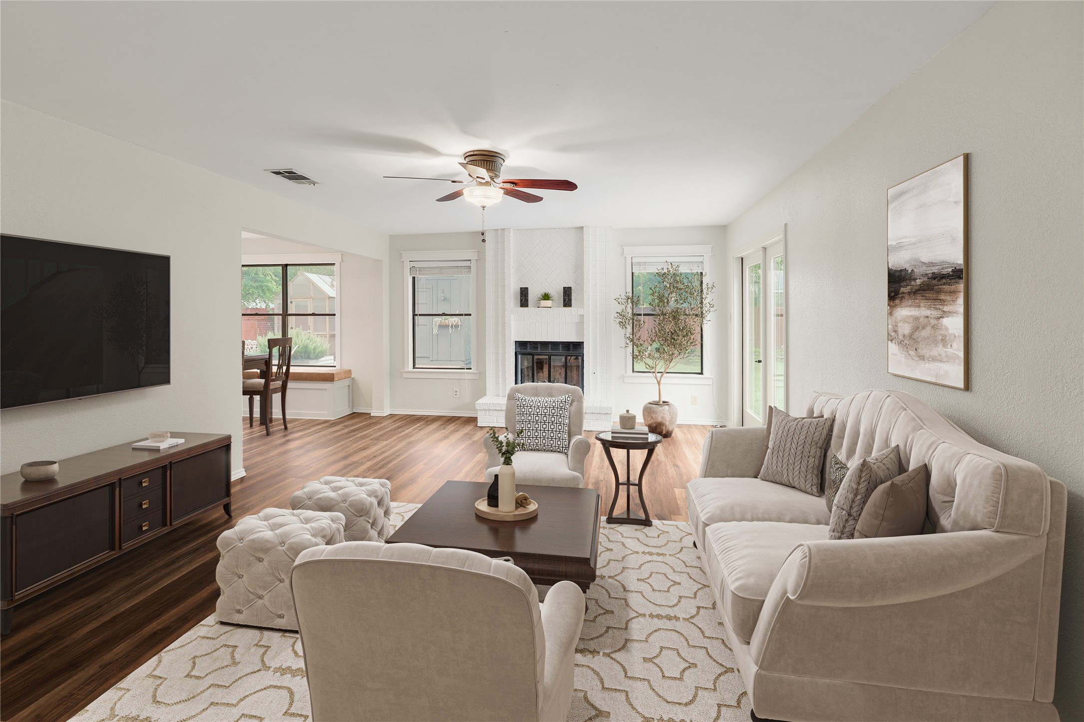 409 Cedar Mound Pass Cedar Park, TX 78613 - Photo 3 of 18 a living room with furniture flat screen tv and a fireplace