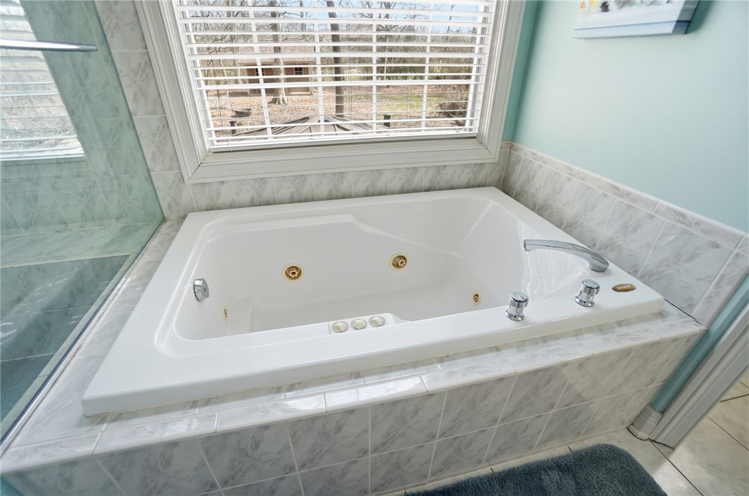 472 Timber Walk Court Springboro, OH 45066 - Photo 23 of 86 Relax in this inviting bathroom featuring a spacious soaking tub, perfect for unwinding.