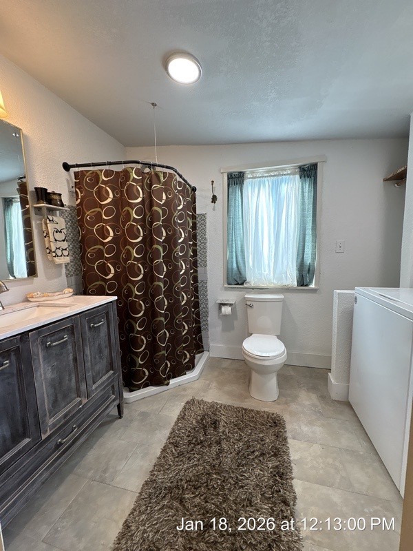 527 2nd Street Bayside, TX 78340 - Photo 23 of 32 a bathroom with a sink toilet and shower