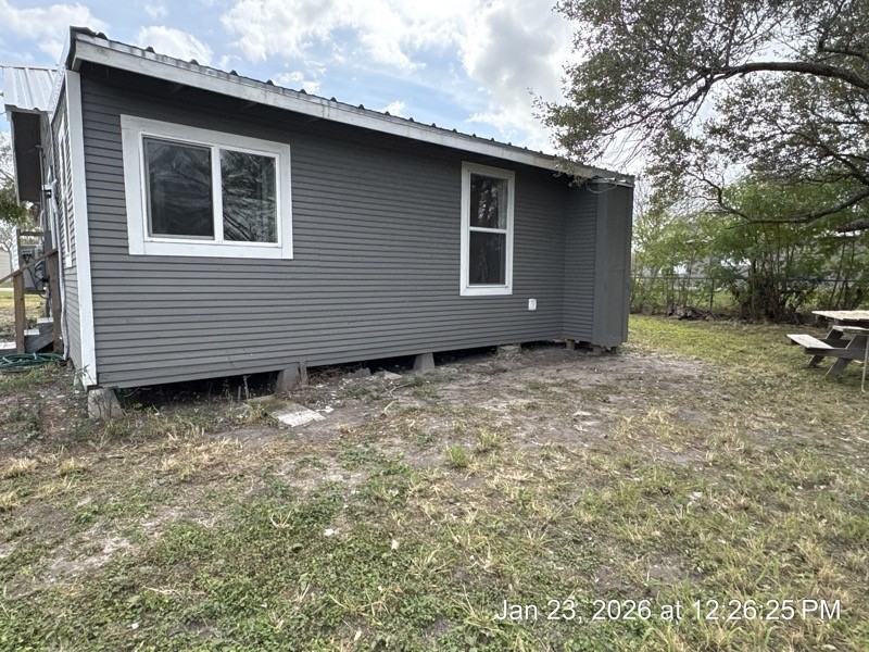 527 2nd Street Bayside, TX 78340 - Photo 30 of 32 a backyard of a house