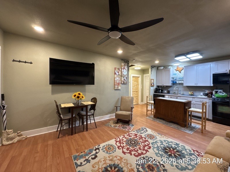527 2nd Street Bayside, TX 78340 - Photo 4 of 32 a living room with furniture and a flat screen tv