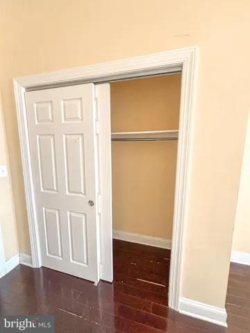 a view of front door with wooden floor