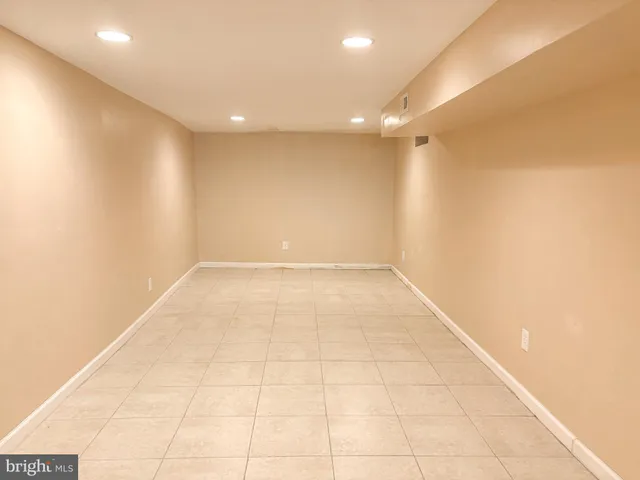 a view of hallway with a large window