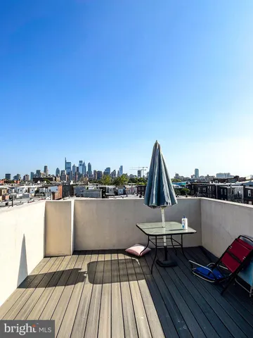 a view of a terrace with sitting area