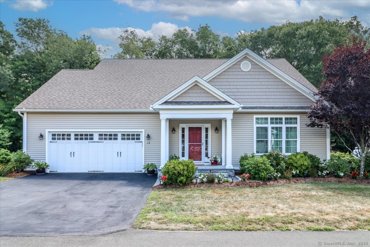 13 Aberdeen Way, Unit 13 Durham, CT 06422 - Photo 1 of 1 a view of a house with a yard and potted plants