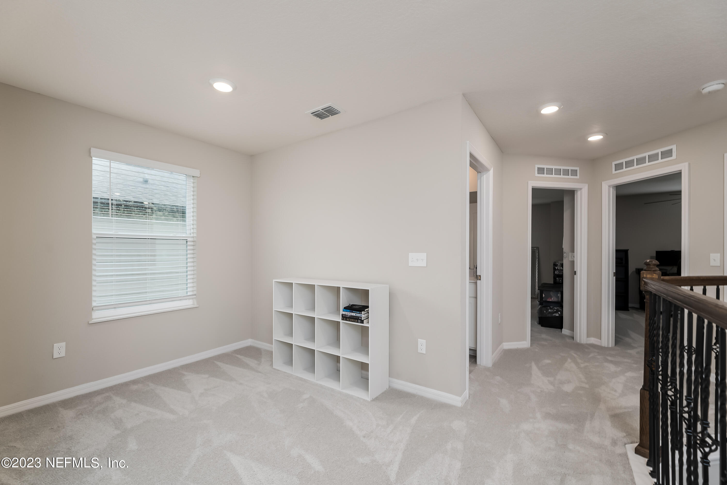 101 Deer Trail St. Augustine, FL 32095 - Photo 11 of 22 a view of livingroom with an empty space and a window