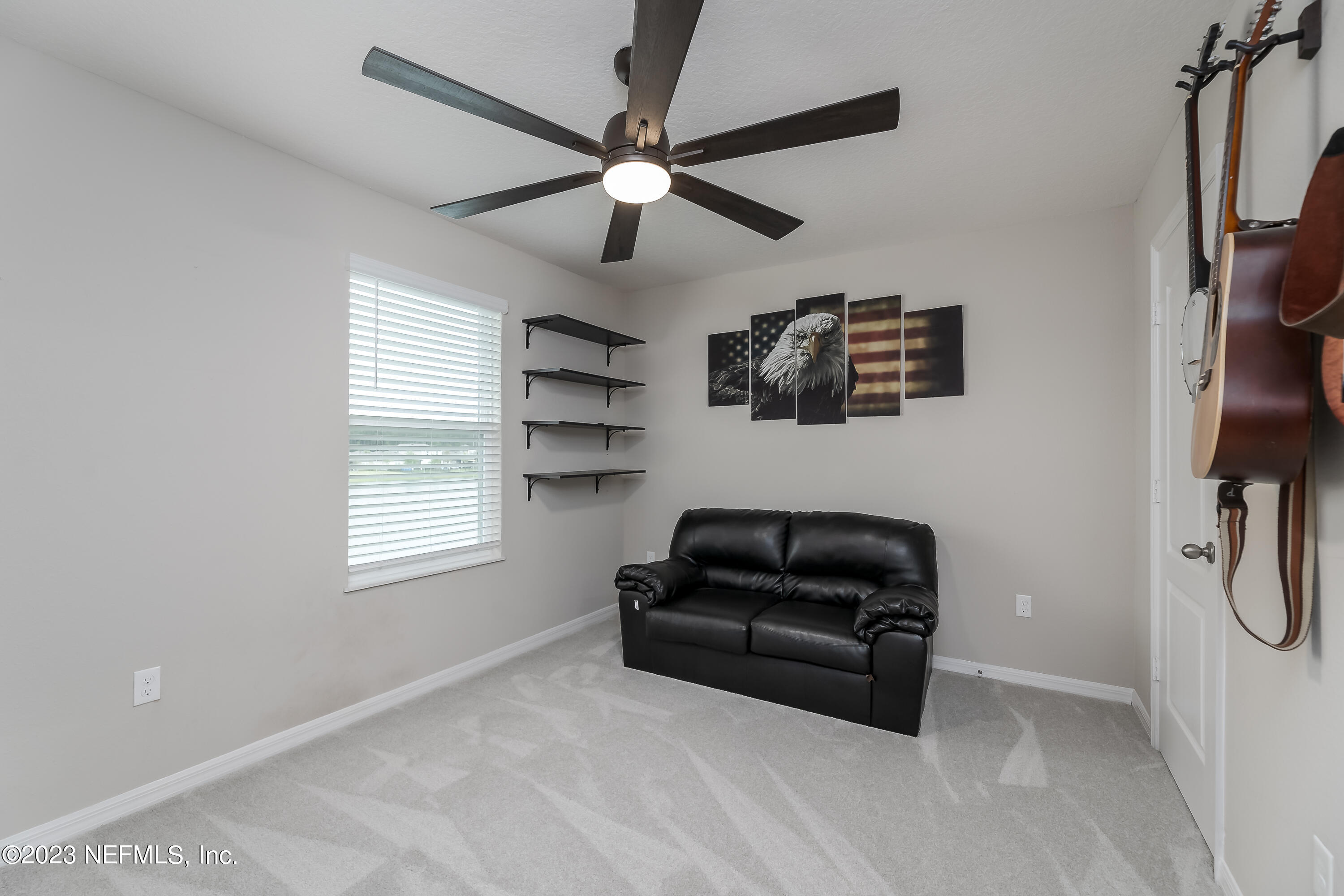 101 Deer Trail St. Augustine, FL 32095 - Photo 12 of 22 a living room with furniture and a window
