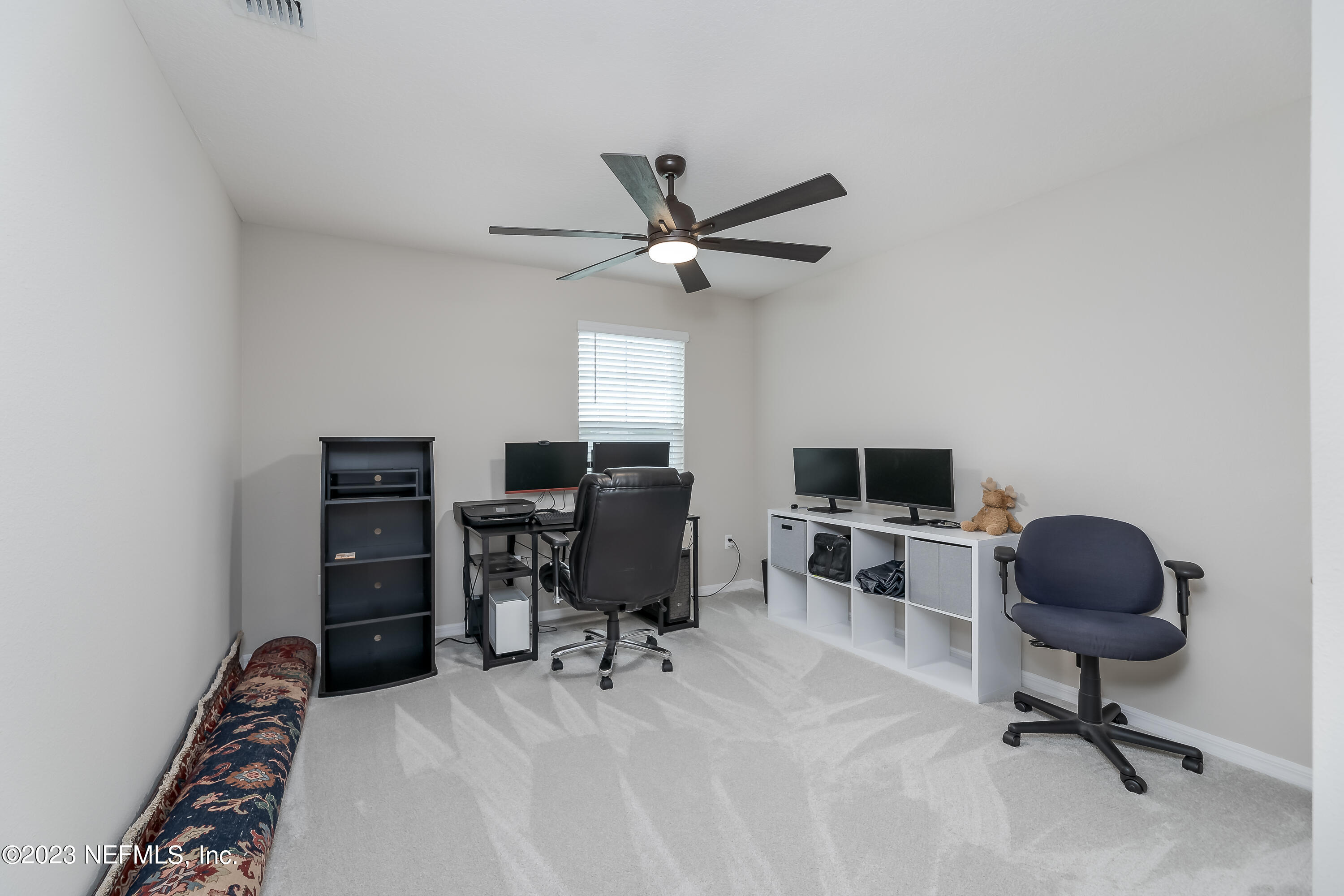 101 Deer Trail St. Augustine, FL 32095 - Photo 17 of 22 a view of a workspace with furniture