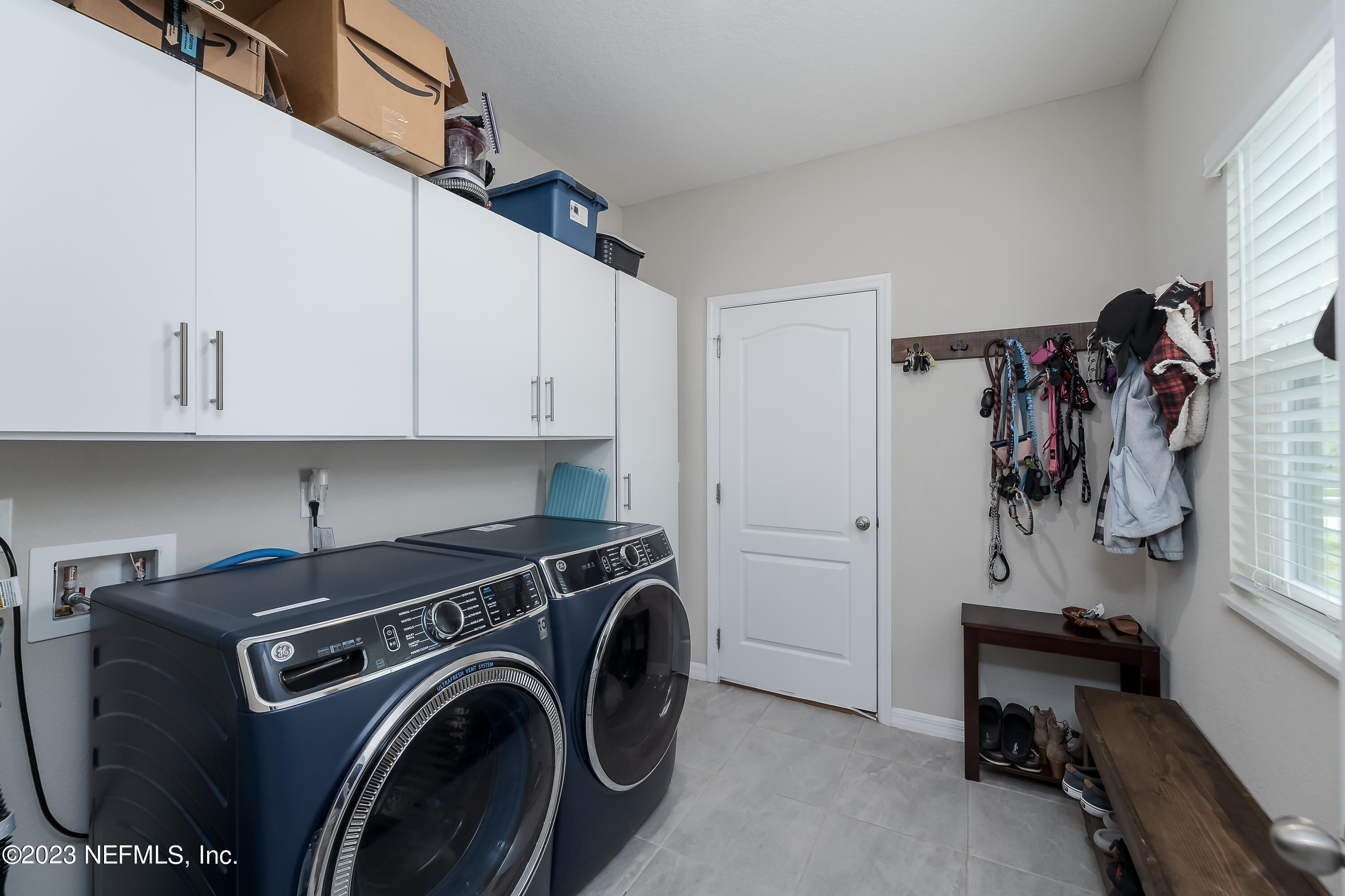 101 Deer Trail St. Augustine, FL 32095 - Photo 10 of 22 a view of storage and utility room with washer and dryer