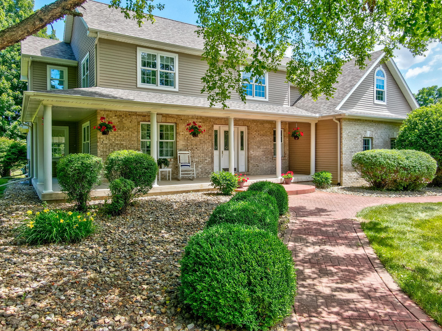 2656 East 1559th Road Ottawa, IL 61350 - Photo 1 of 49 a front view of a house with garden