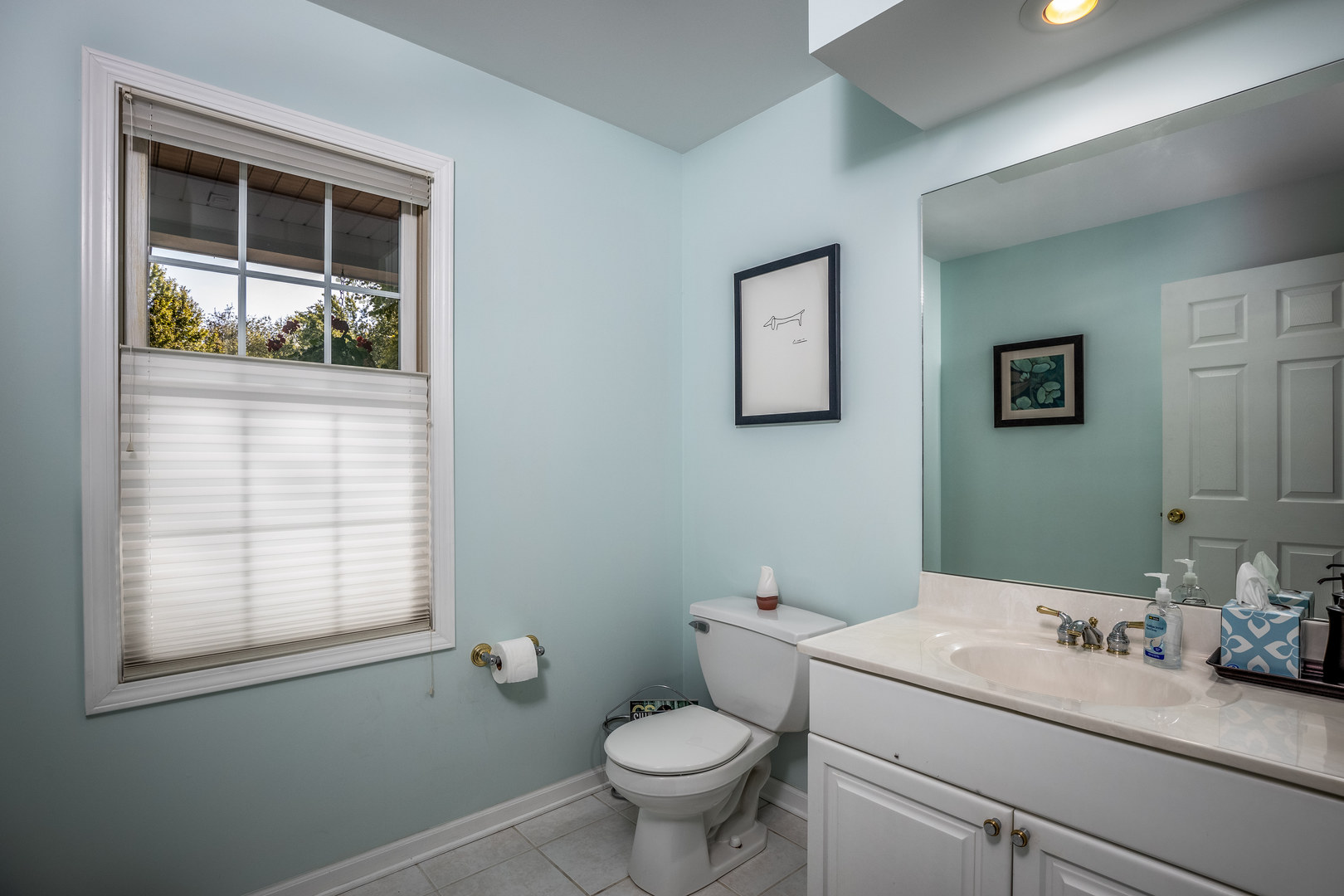 2656 East 1559th Road Ottawa, IL 61350 - Photo 17 of 49 a bathroom with a toilet sink and window