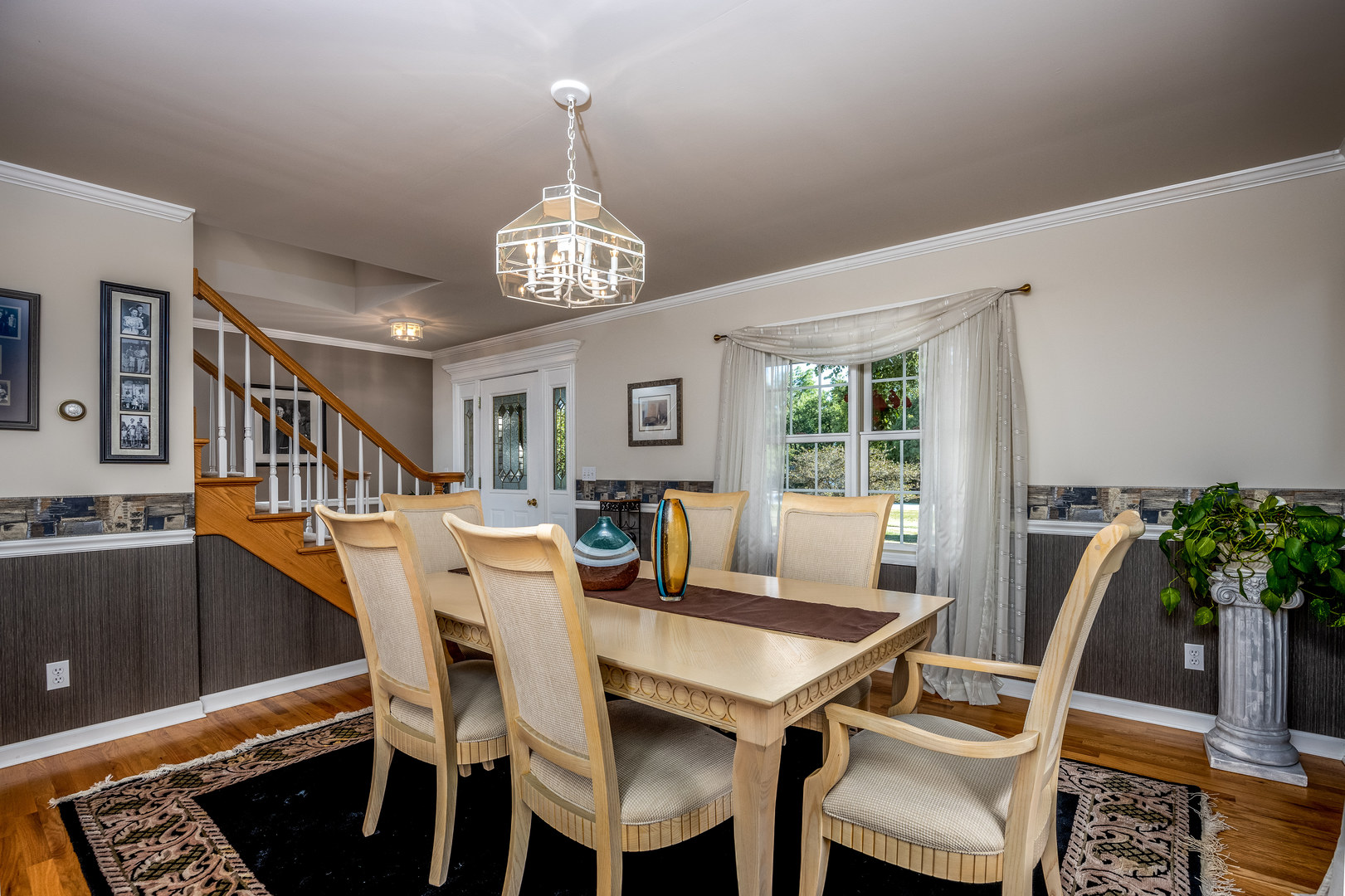 2656 East 1559th Road Ottawa, IL 61350 - Photo 19 of 49 a view of a dining room with furniture window and wooden floor
