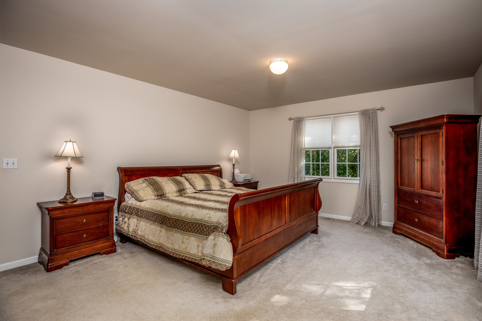 2656 East 1559th Road Ottawa, IL 61350 - Photo 33 of 49 a bed room with a bed and a lamp