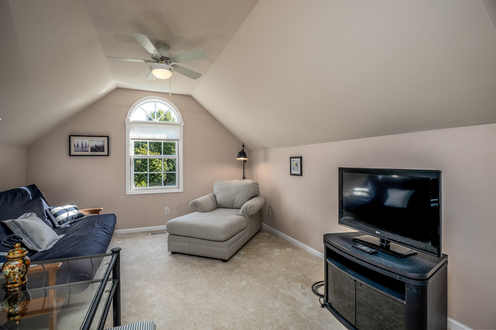 2656 East 1559th Road Ottawa, IL 61350 - Photo 37 of 49 a living room with furniture and a flat screen tv