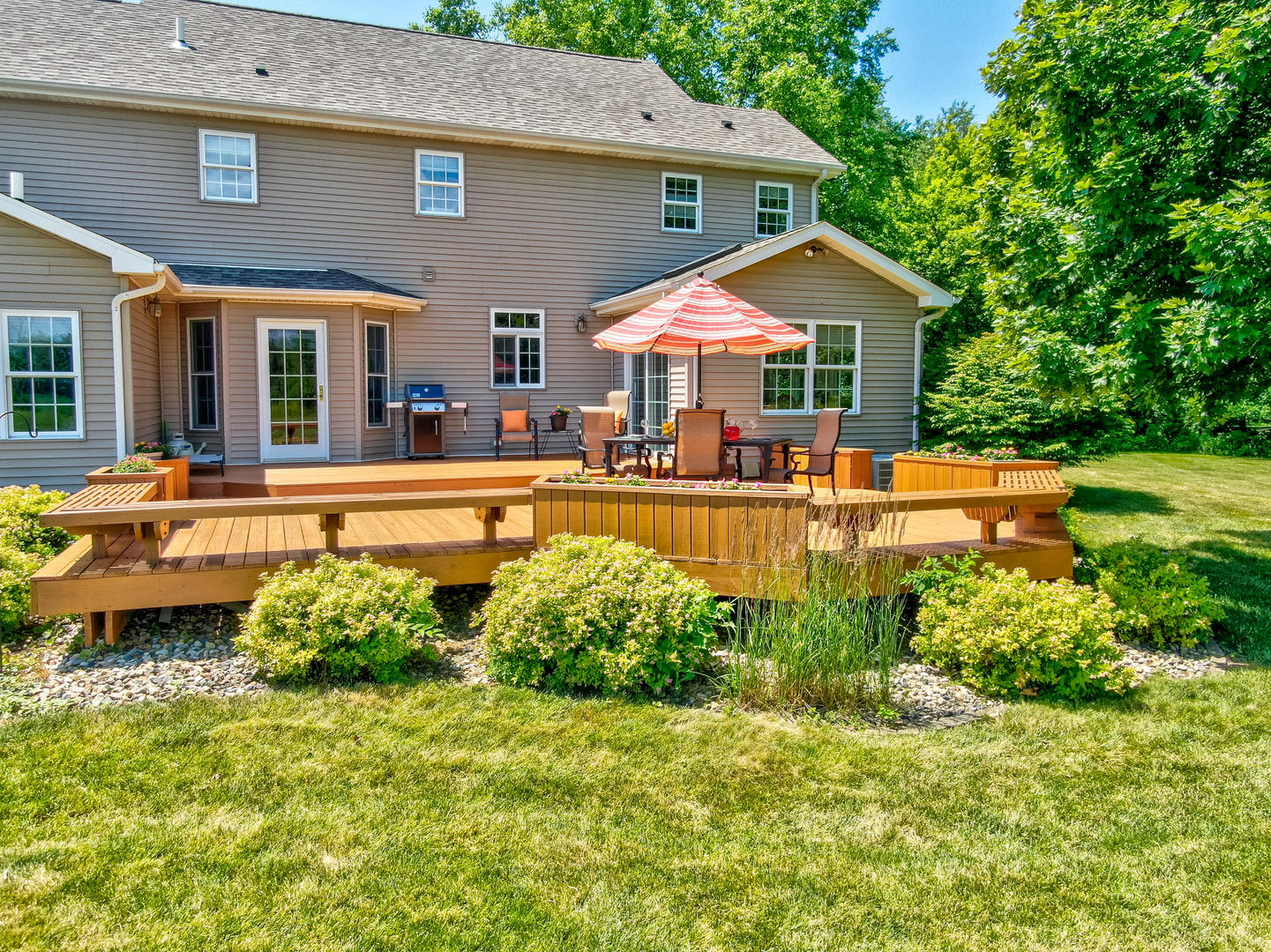 2656 East 1559th Road Ottawa, IL 61350 - Photo 49 of 49 a front view of a house with a yard table and chairs
