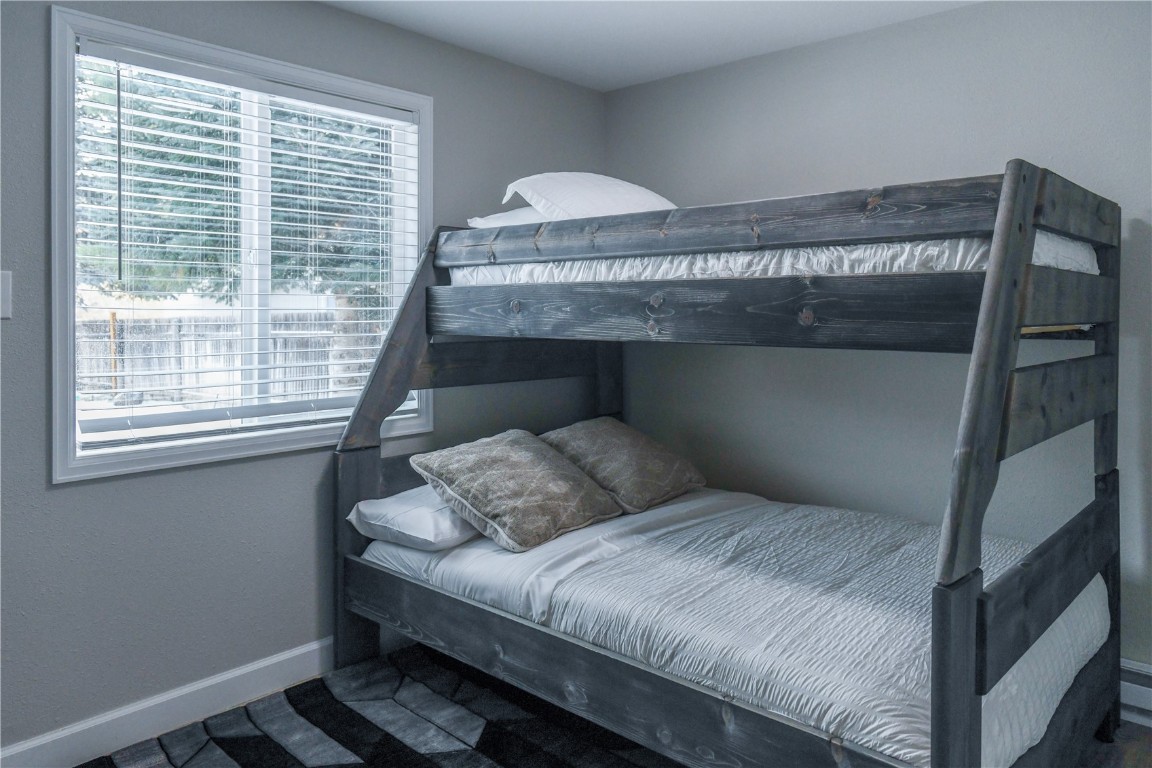 452 Cascade Circle Silverthorne, CO 80498 - Photo 25 of 35 a bedroom with a bed and a window
