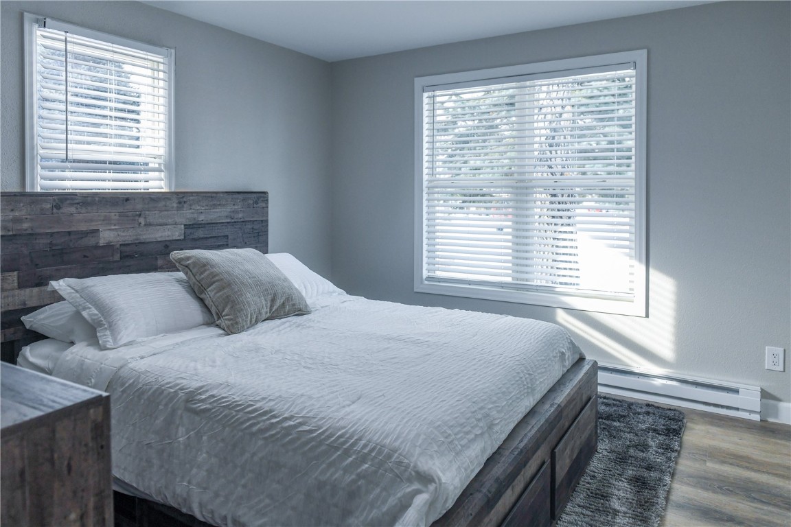 452 Cascade Circle Silverthorne, CO 80498 - Photo 27 of 35 a bedroom with a bed and a window
