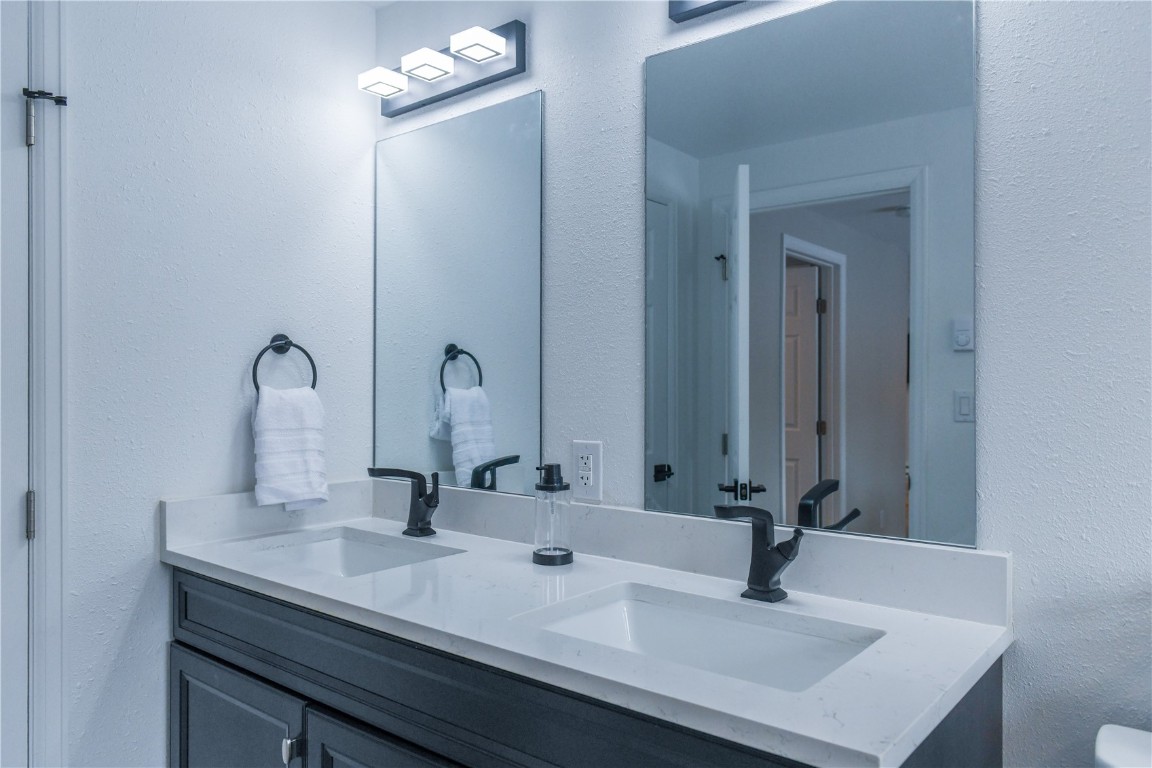 452 Cascade Circle Silverthorne, CO 80498 - Photo 3 of 35 a bathroom with double vanity sinks and a mirror