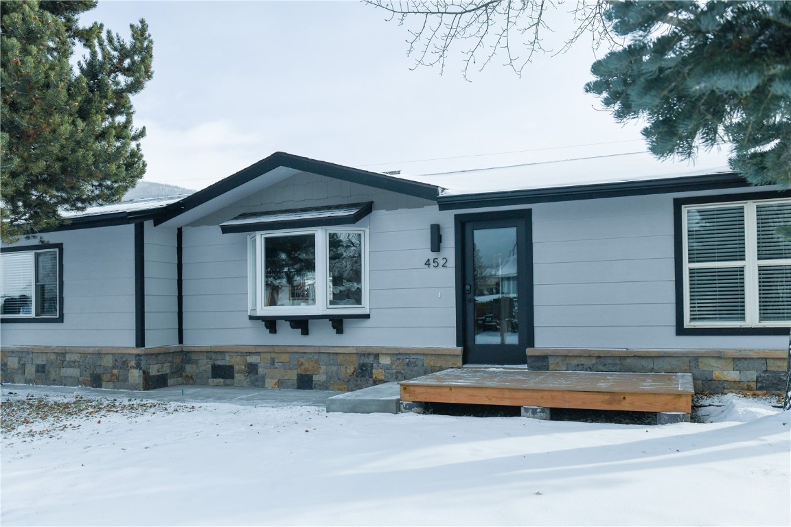 452 Cascade Circle Silverthorne, CO 80498 - Photo 35 of 35 a front view of a house with a garden