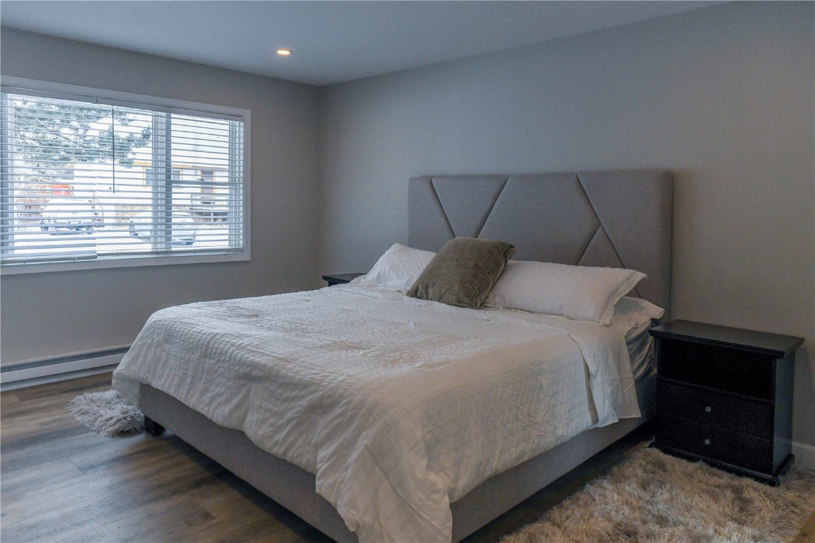 452 Cascade Circle Silverthorne, CO 80498 - Photo 4 of 35 a bedroom with a bed and a window