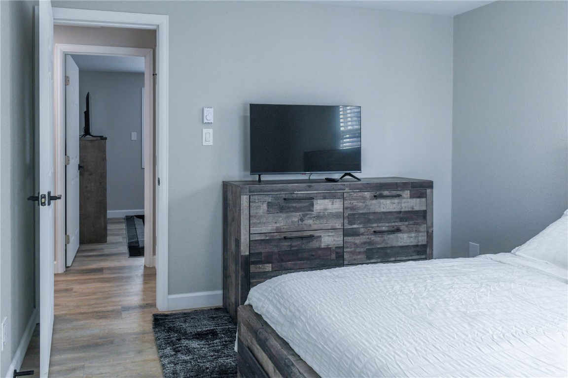 452 Cascade Circle Silverthorne, CO 80498 - Photo 5 of 35 a bedroom with a bed and a television