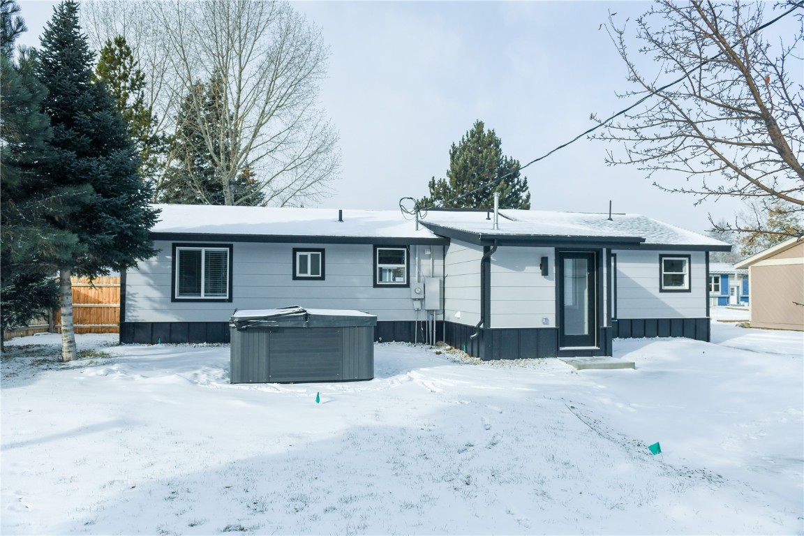 452 Cascade Circle Silverthorne, CO 80498 - Photo 7 of 35 a front view of a house with a covered with snow in front of house