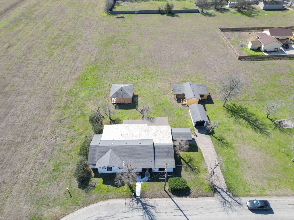 1414 5th Lockhart, TX 78644 - Photo 7 of 9 an aerial view of a house with a yard