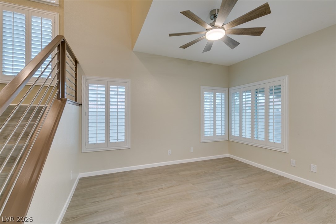 540 Sutters Mill Road Henderson, NV 89014 - Photo 15 of 46 This living space features high ceilings and ample natural light, creating an airy and inviting atmosphere.