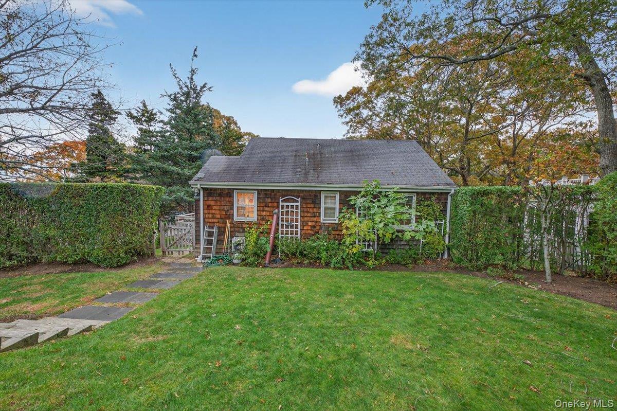 3748 Noyack Road Sag Harbor, NY 11963 - Photo 11 of 15 a view of a yard in front of house