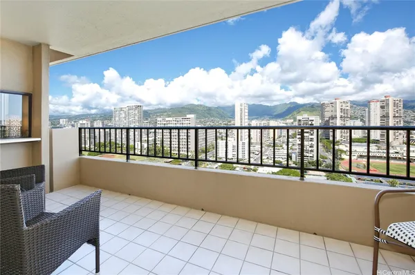 a view of balcony with furniture