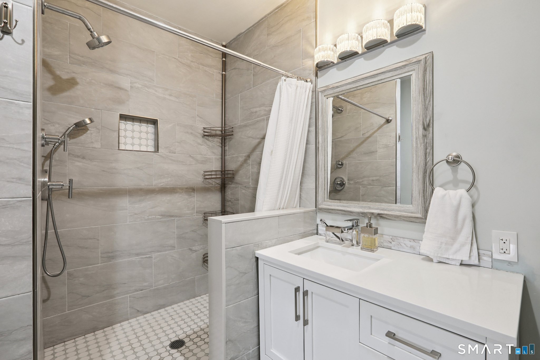 6 Ezra Road Danbury, CT 06811 - Photo 13 of 22 a bathroom with a sink vanity granite and shower