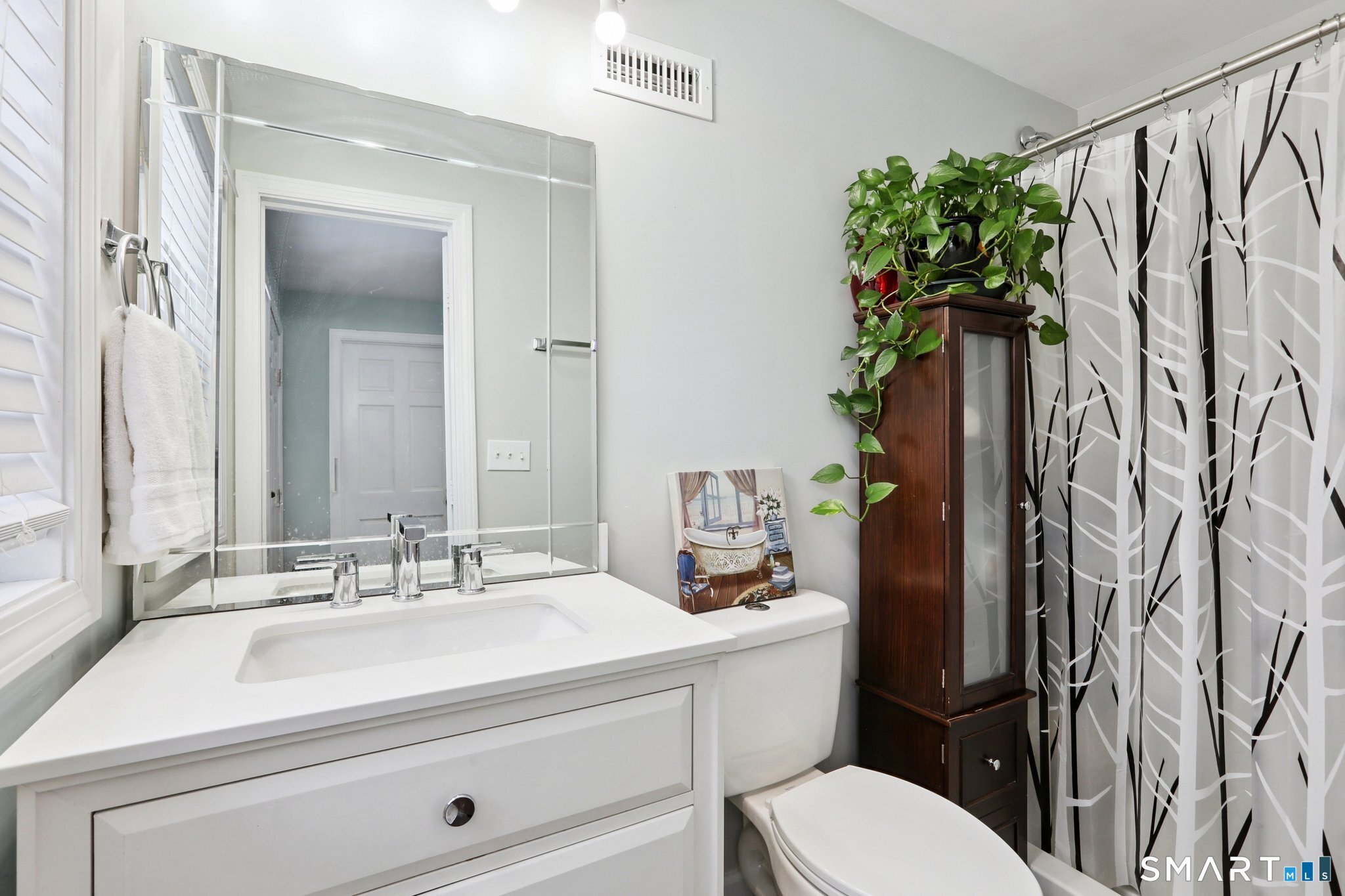 6 Ezra Road Danbury, CT 06811 - Photo 17 of 22 a bathroom with a toilet sink and shower