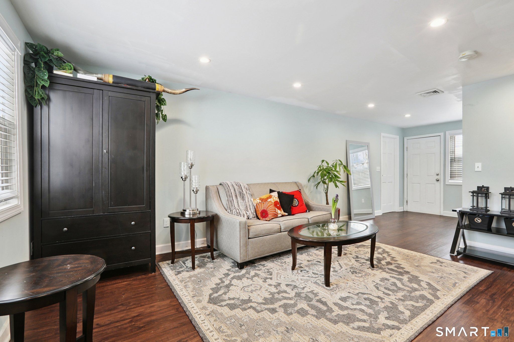 6 Ezra Road Danbury, CT 06811 - Photo 19 of 22 a living room with furniture and wooden floor