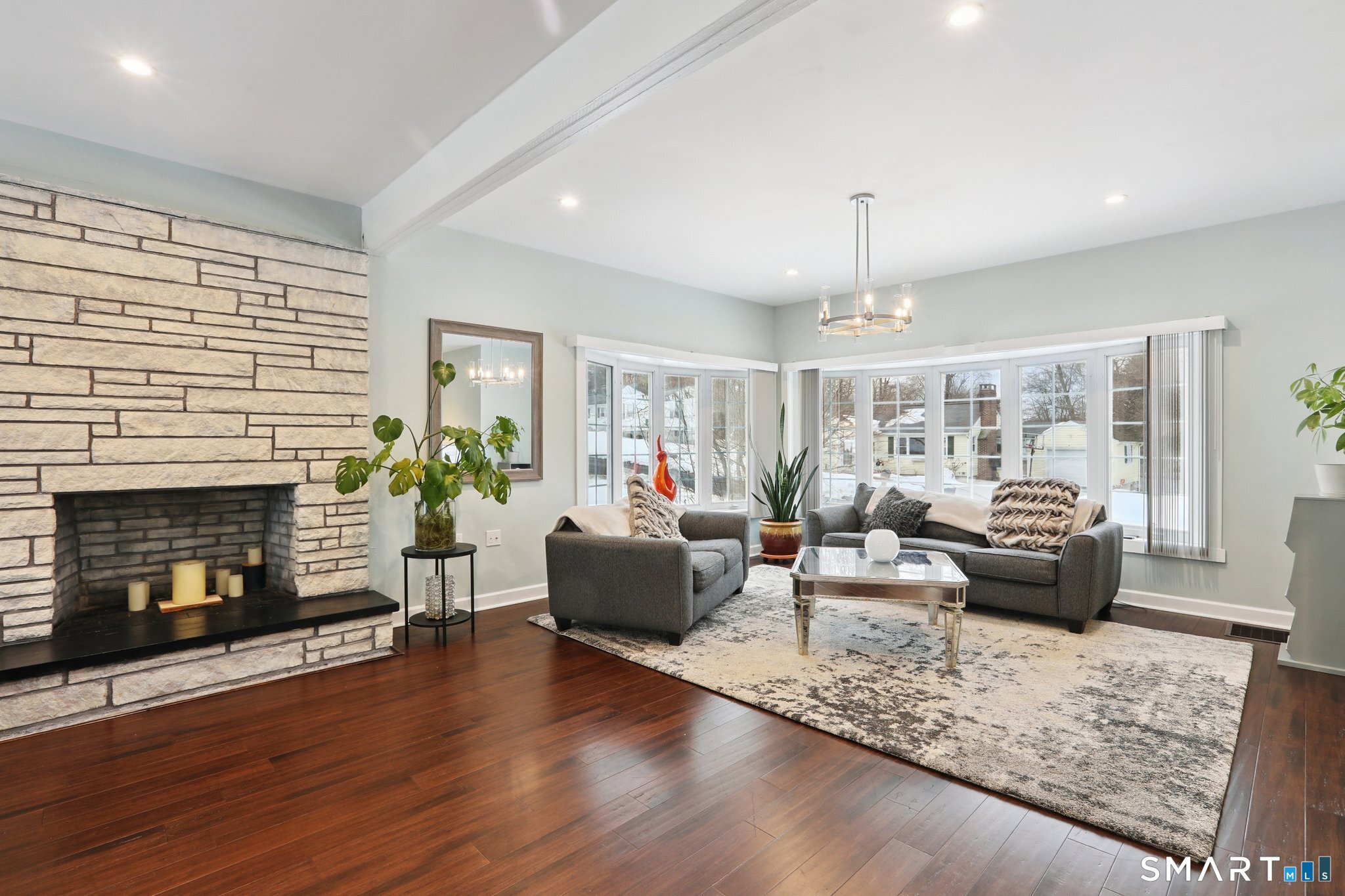 6 Ezra Road Danbury, CT 06811 - Photo 2 of 22 a living room with furniture and a fireplace