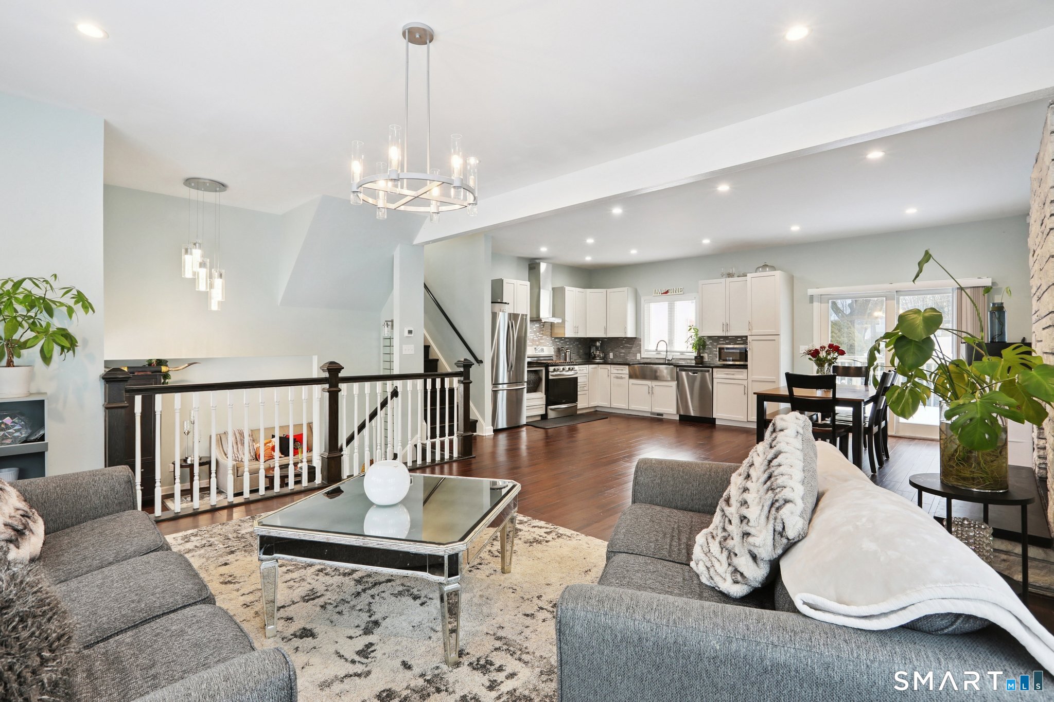 6 Ezra Road Danbury, CT 06811 - Photo 6 of 22 a living room with furniture and wooden floor