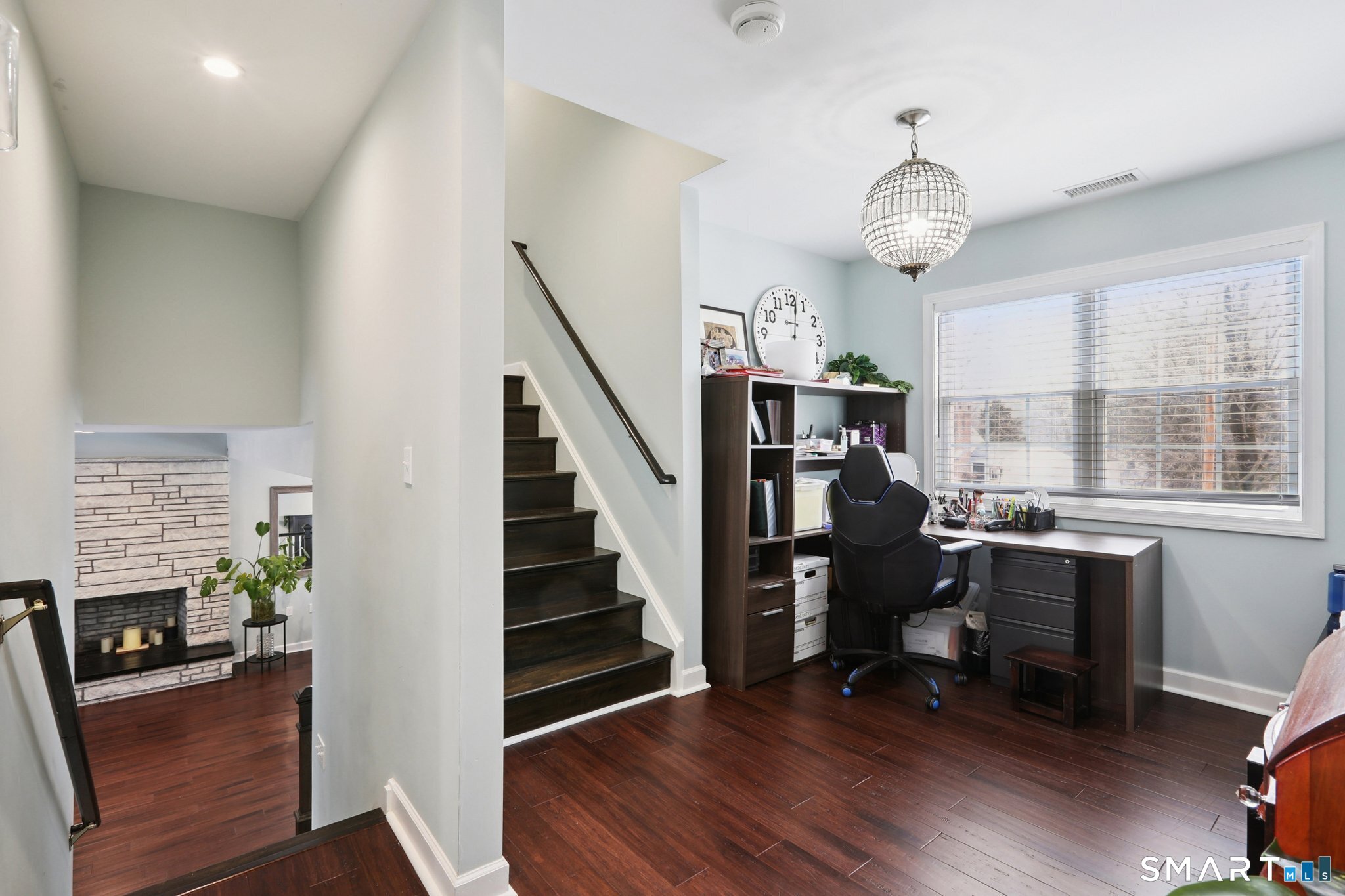 6 Ezra Road Danbury, CT 06811 - Photo 9 of 22 a view of a livingroom with furniture hardwood floor and workspace