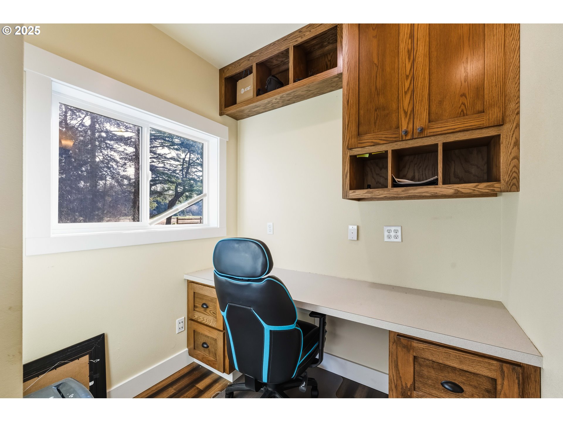 55942 Lost Valley Road Bandon, OR 97411 - Photo 19 of 48 a kitchen with a chair and a stove next to a window