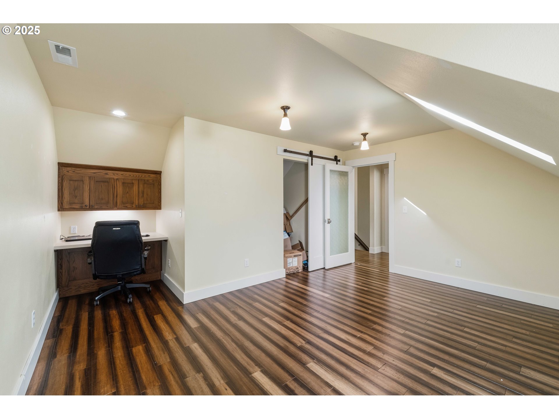 55942 Lost Valley Road Bandon, OR 97411 - Photo 26 of 48 a view interior of house with wooden floor