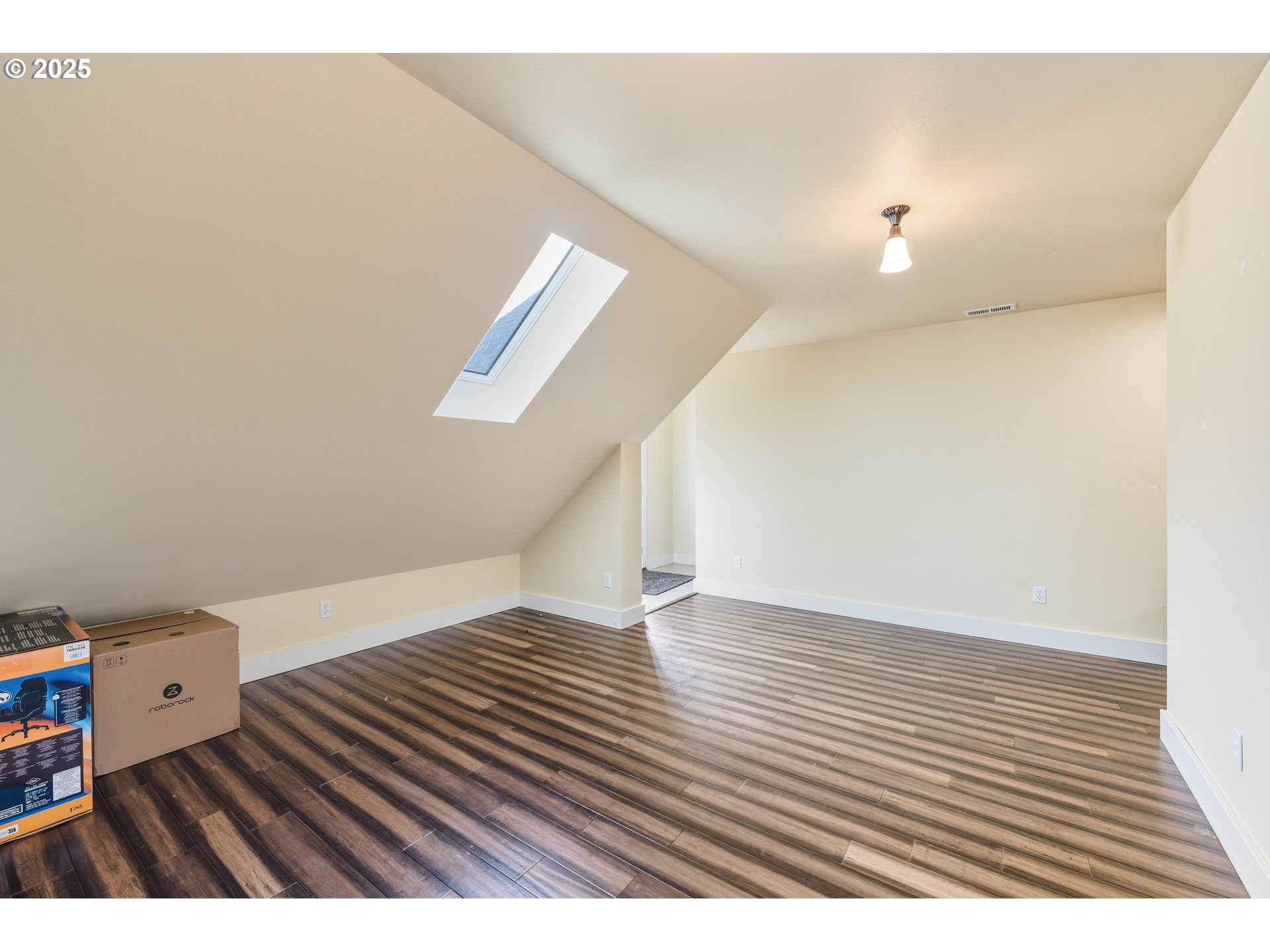 55942 Lost Valley Road Bandon, OR 97411 - Photo 27 of 48 a view of a room with wooden floor
